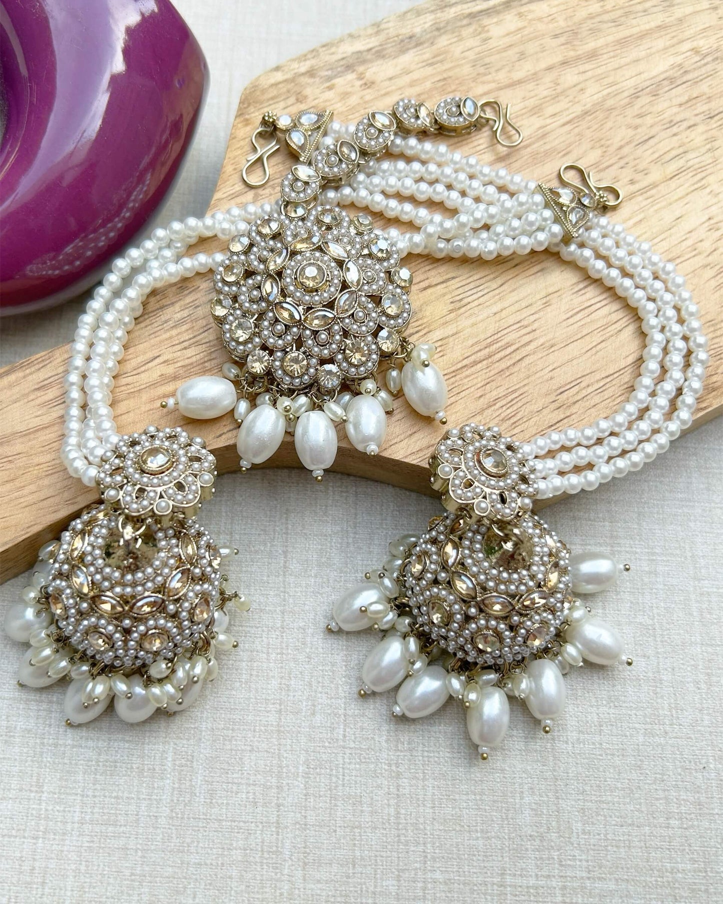 Jhumka with Maang Tika set.