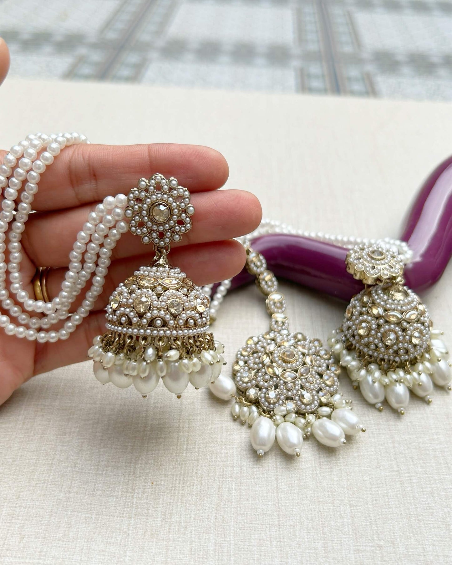 Jhumka with Maang Tika set.