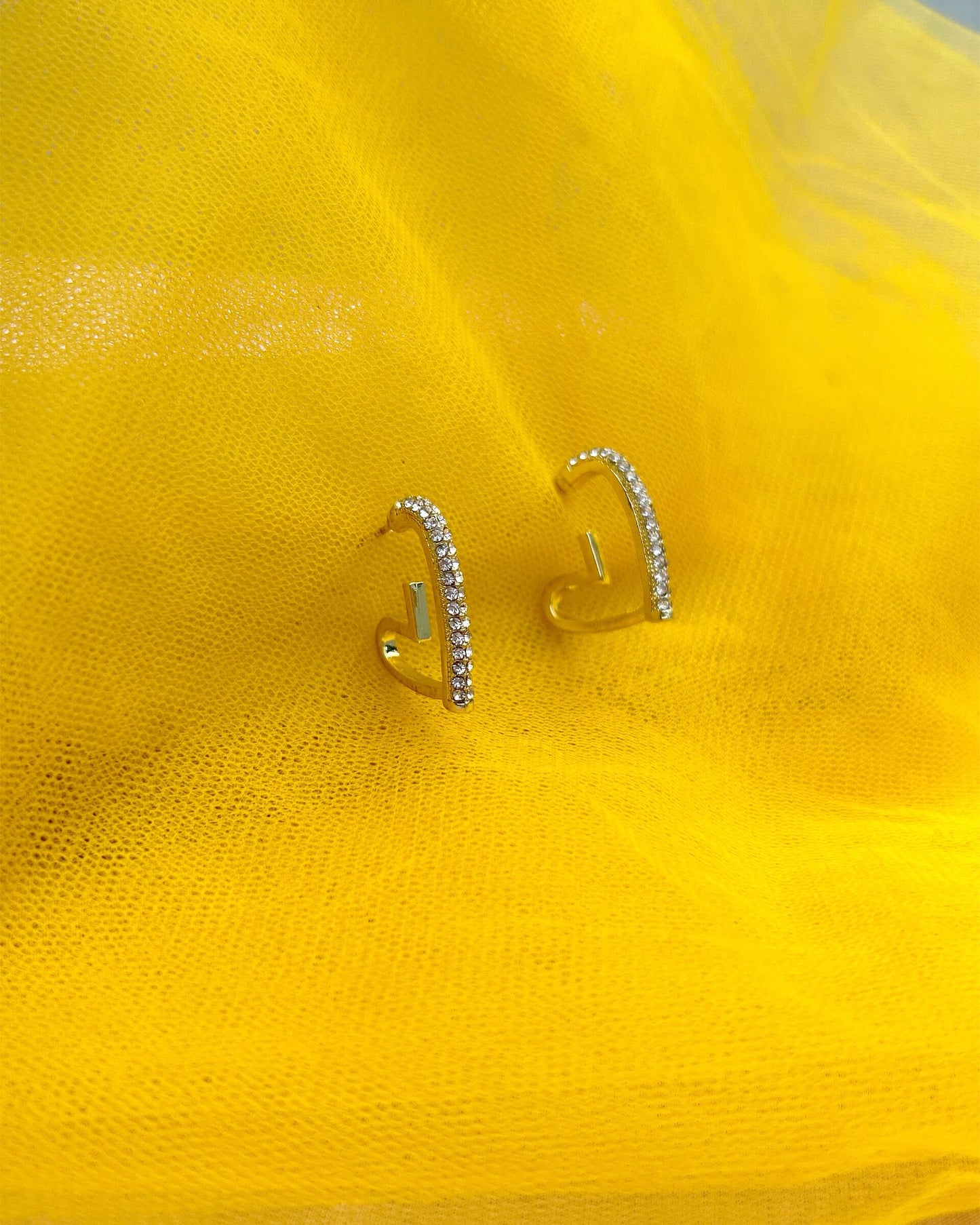 gold coloured earrings