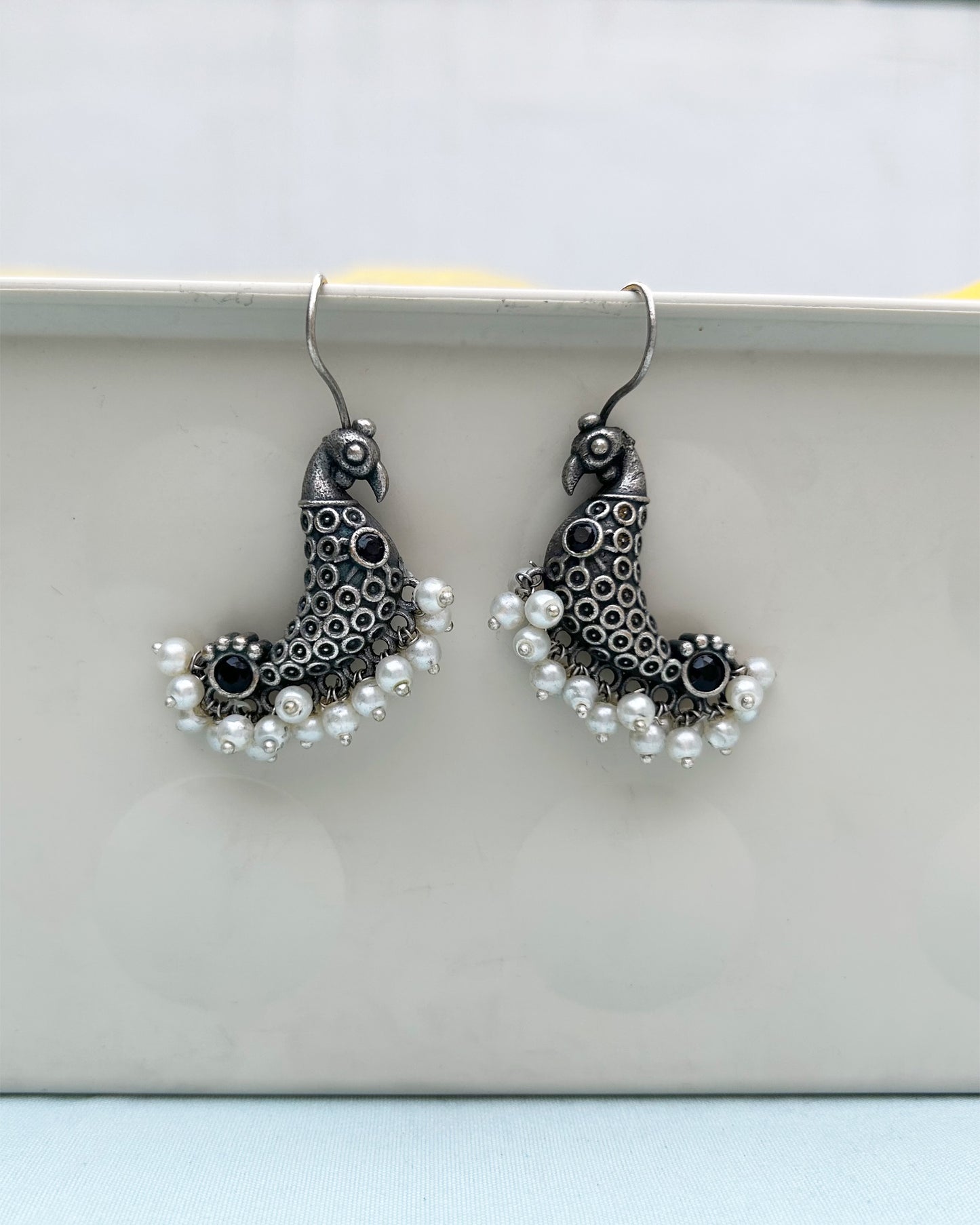 Black Peacock Antique Polish Dangler