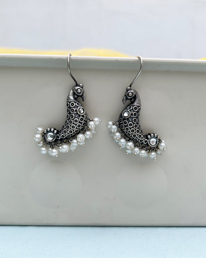 White Peacock Antique Polish Dangler