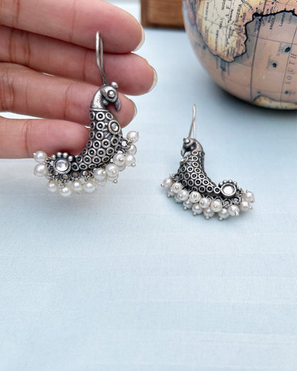 White Peacock Antique Polish Dangler