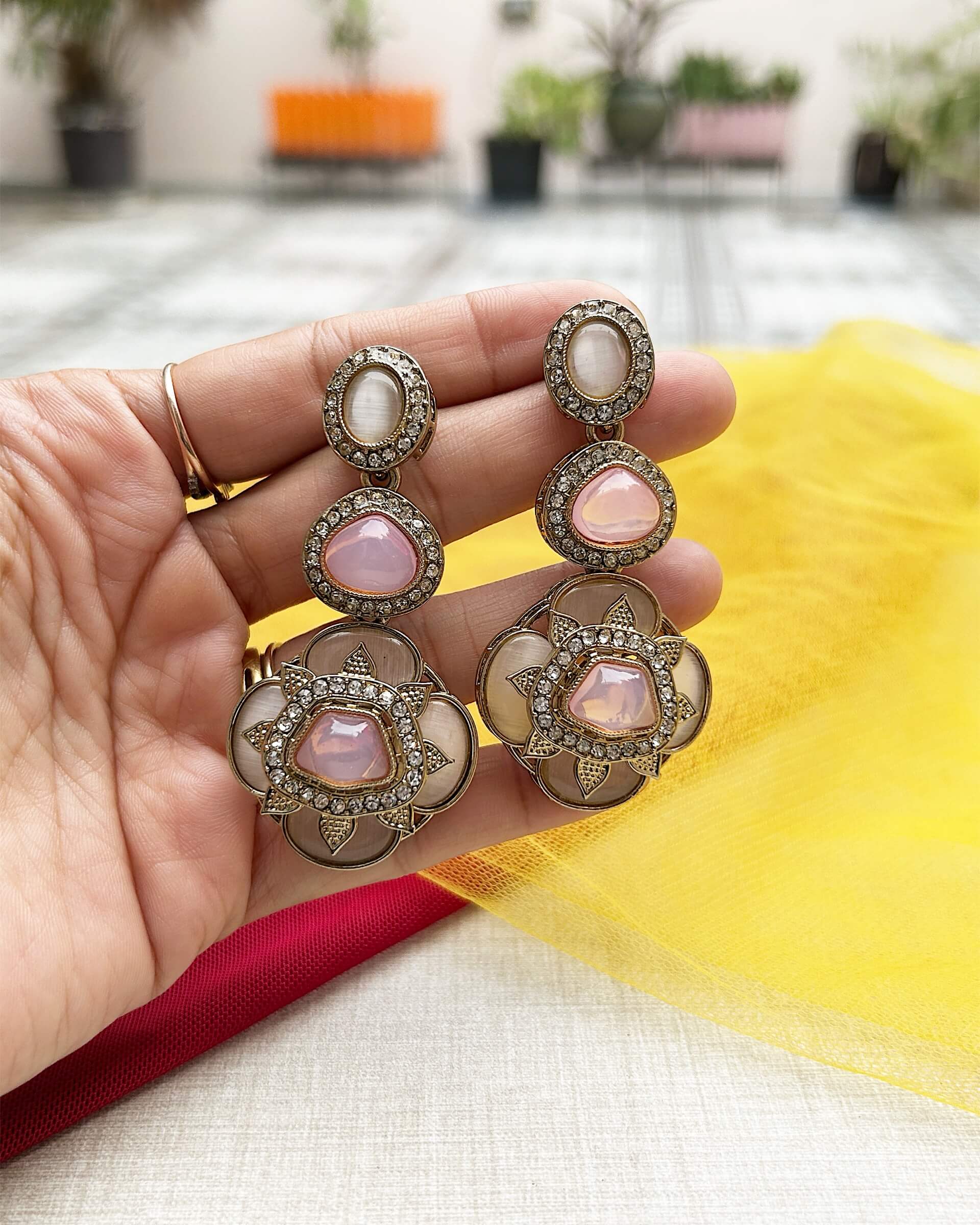 women with earrings