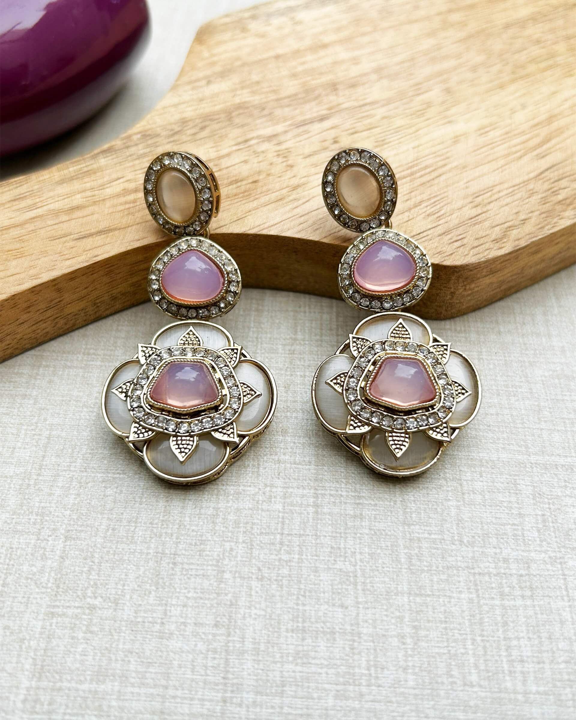 women with earrings