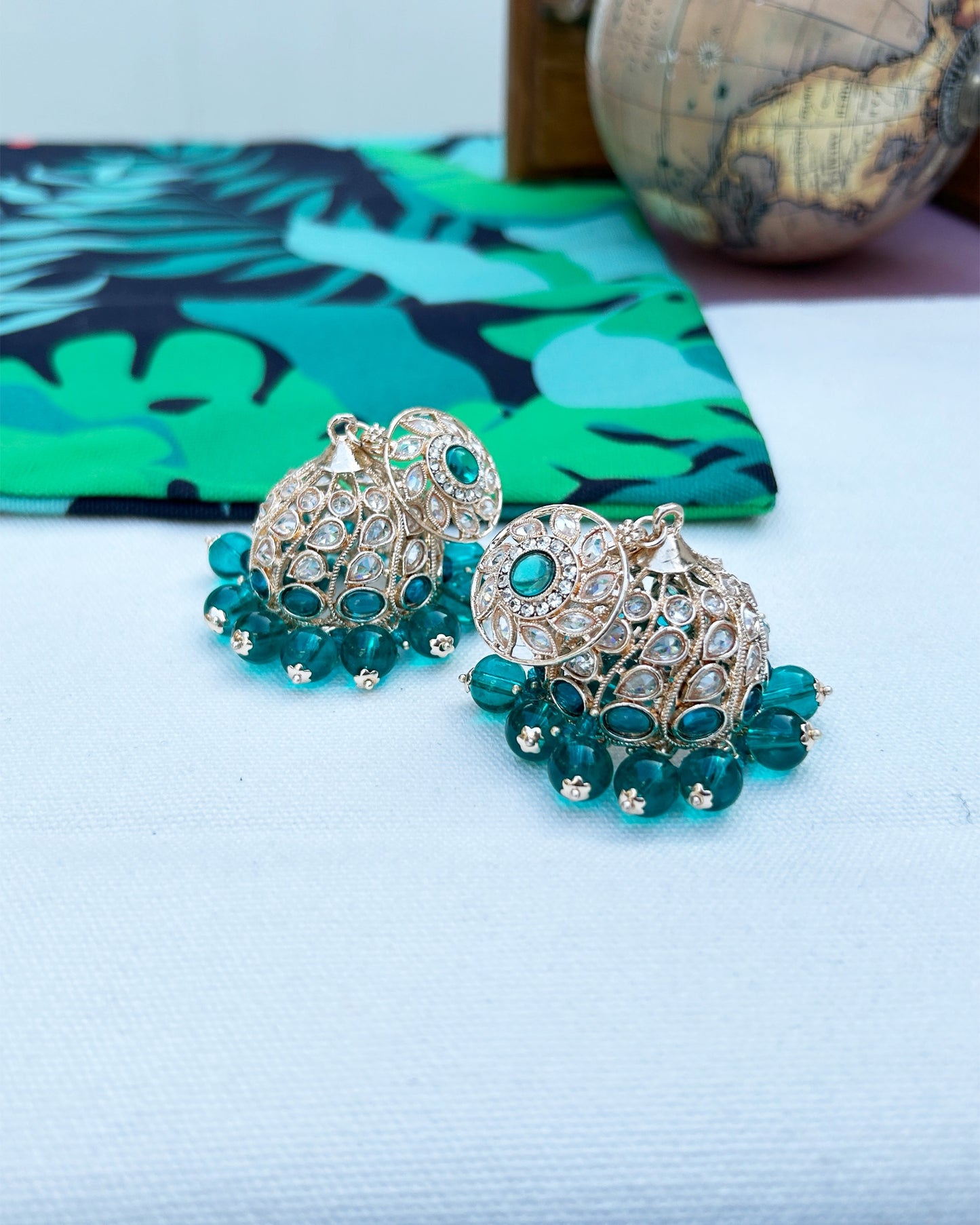 ad stone jhumka earrings