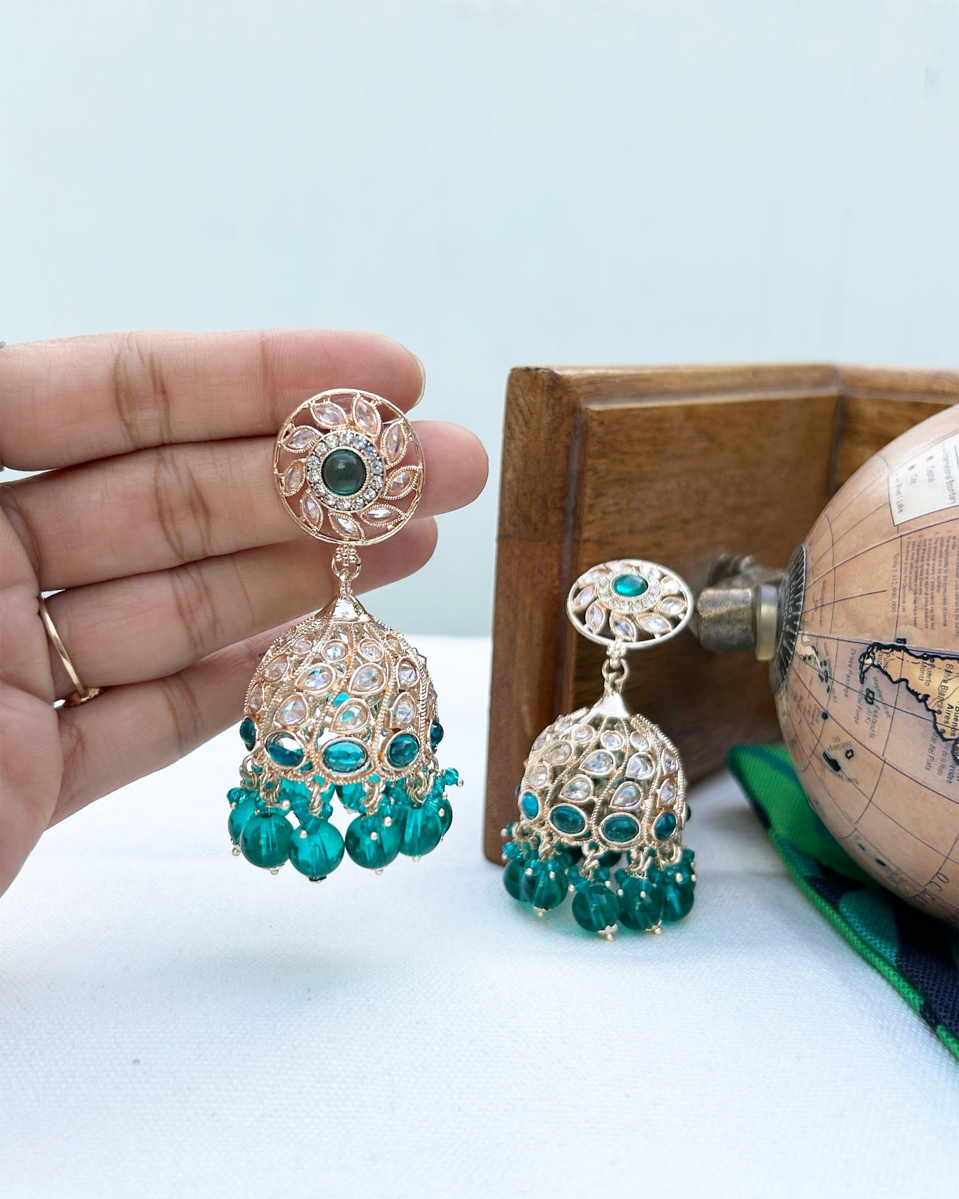 ad stone jhumka earrings