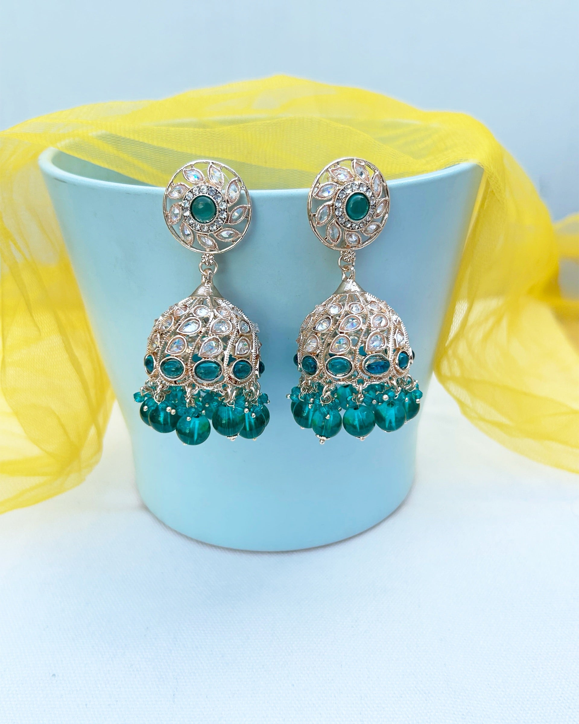 ad stone jhumka earrings