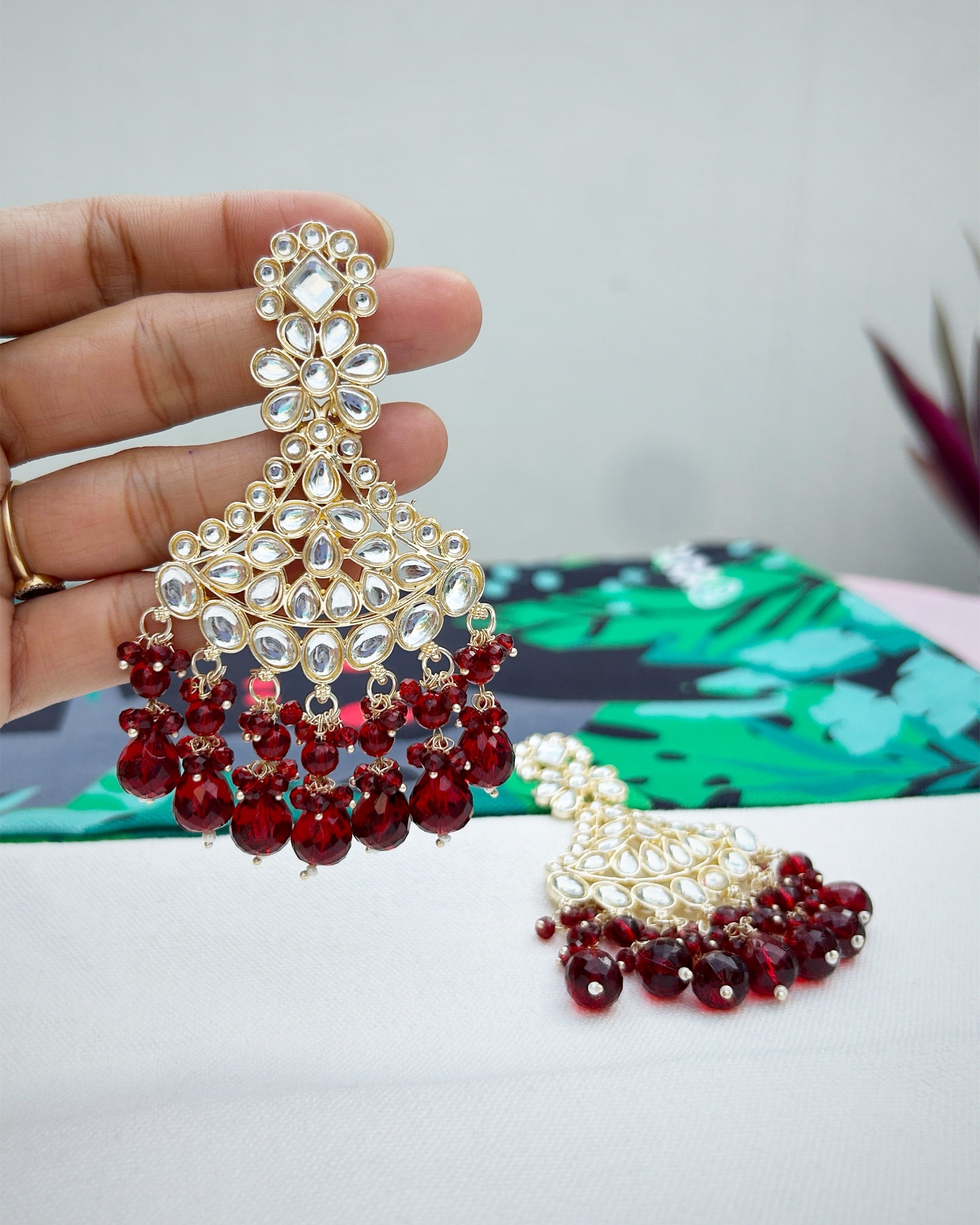 maroon kundan earrings