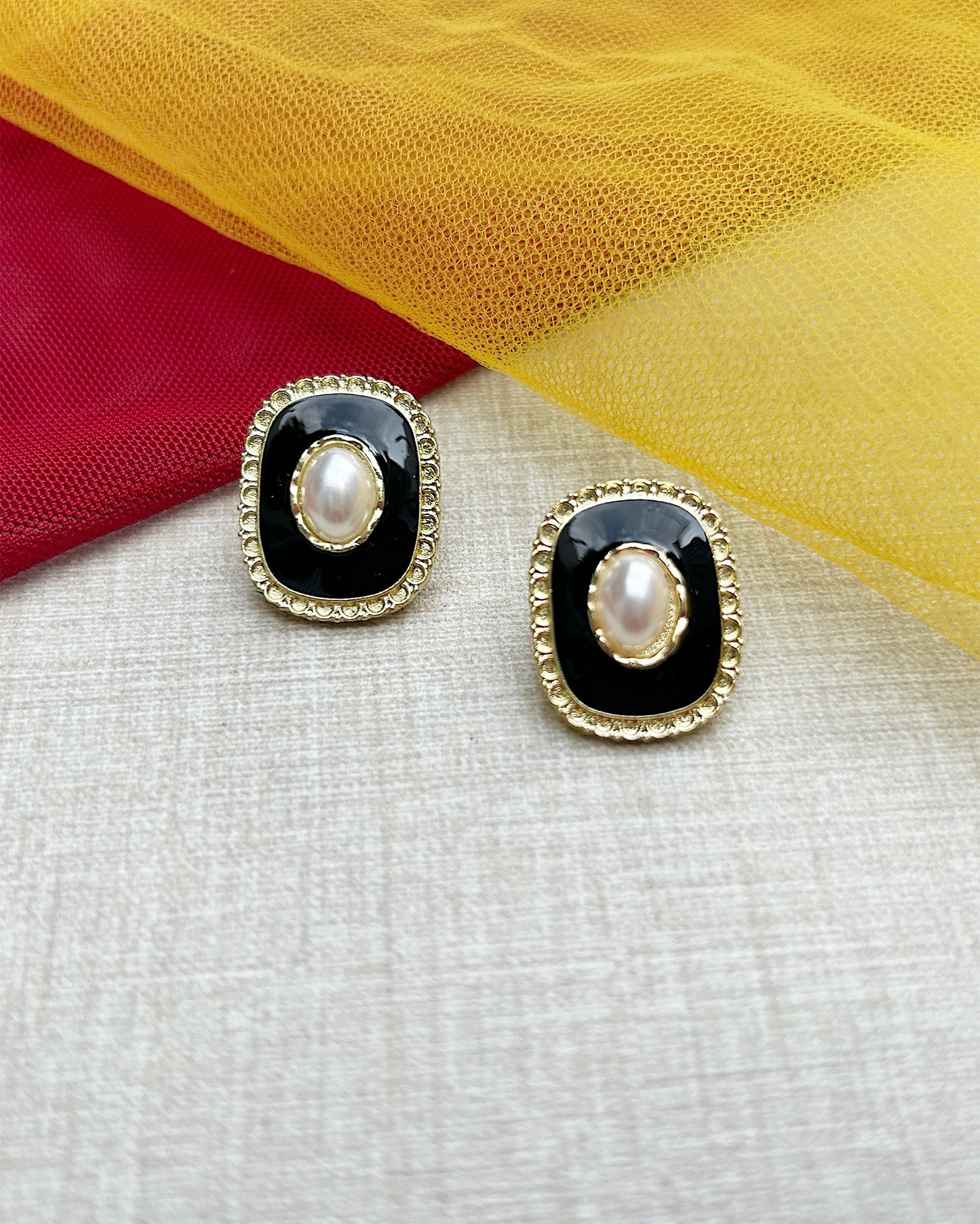 black ear studs