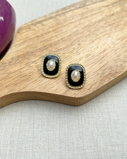 black ear studs