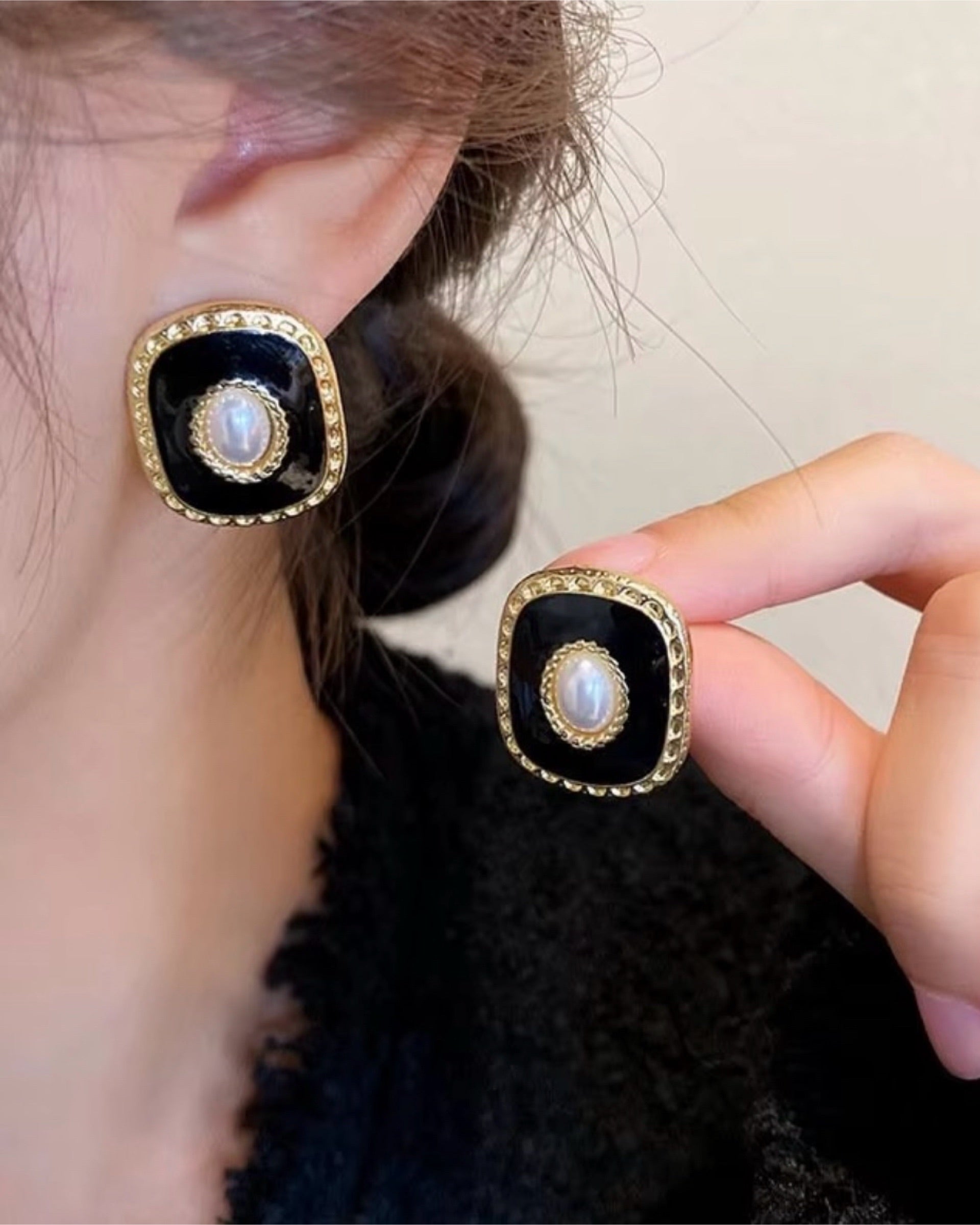 black ear studs