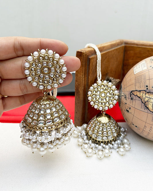 women golden jhumka