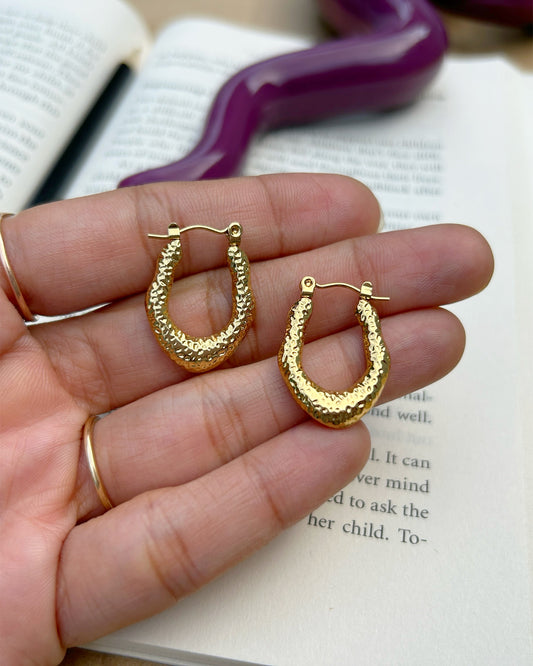 hoop earrings on women