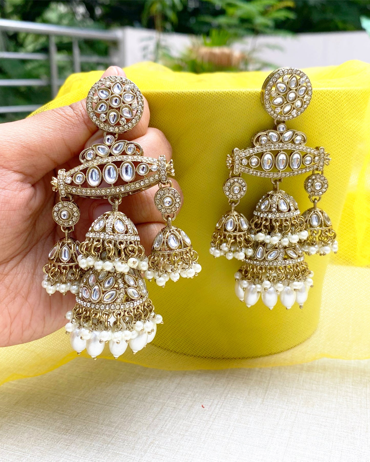 Antique Gold Multi-Tiered Kundan & Pearl Jhumkas