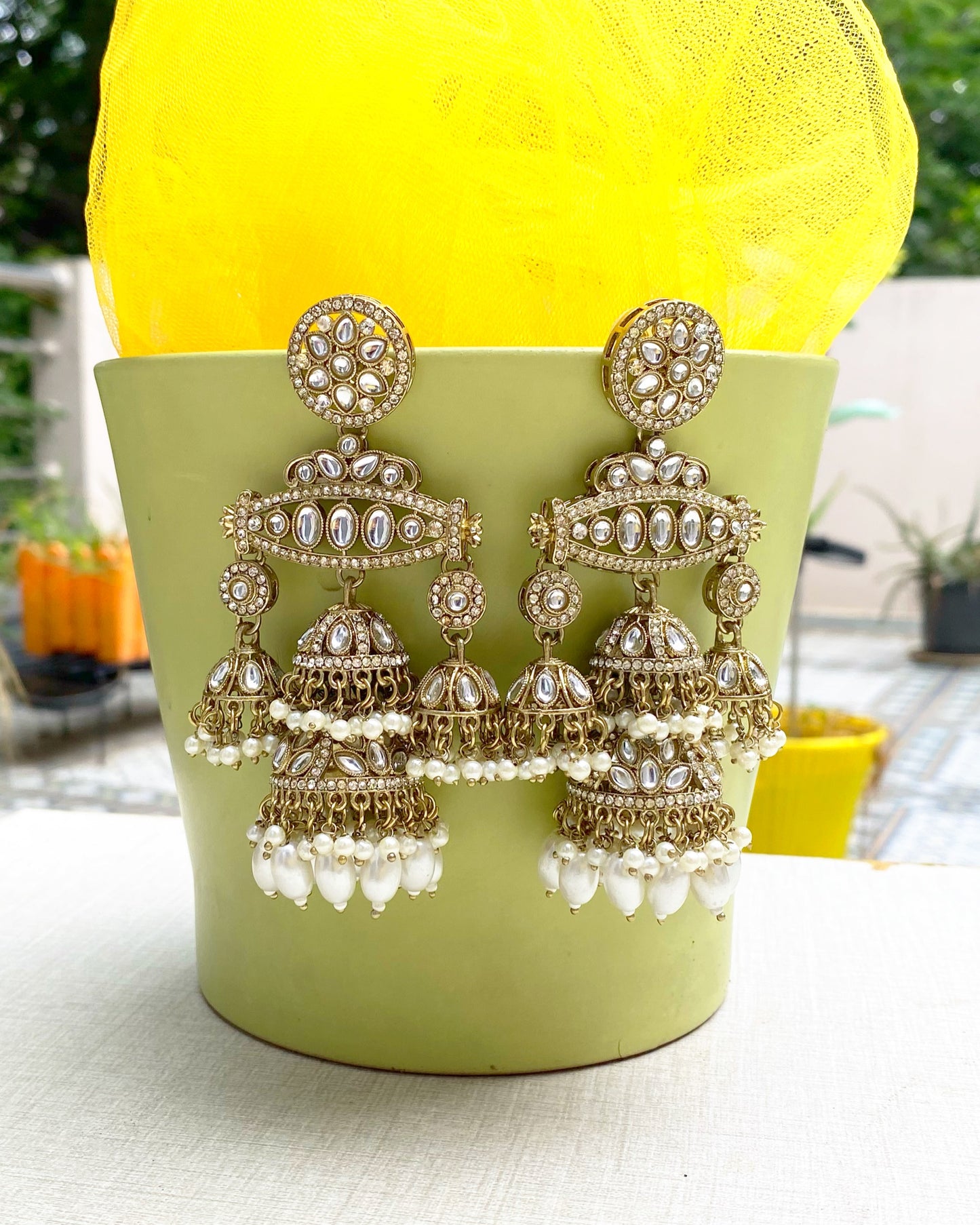 Antique Gold Multi-Tiered Kundan & Pearl Jhumkas