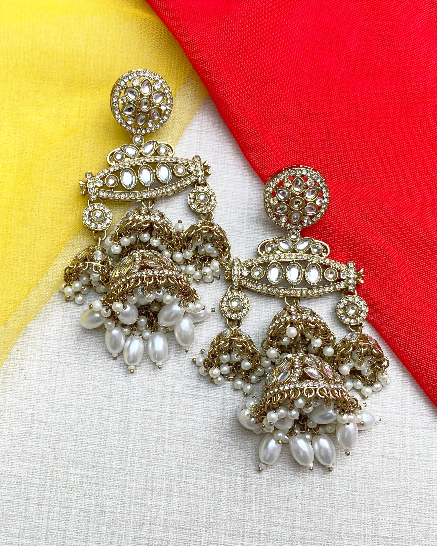 Antique Gold Multi-Tiered Kundan & Pearl Jhumkas