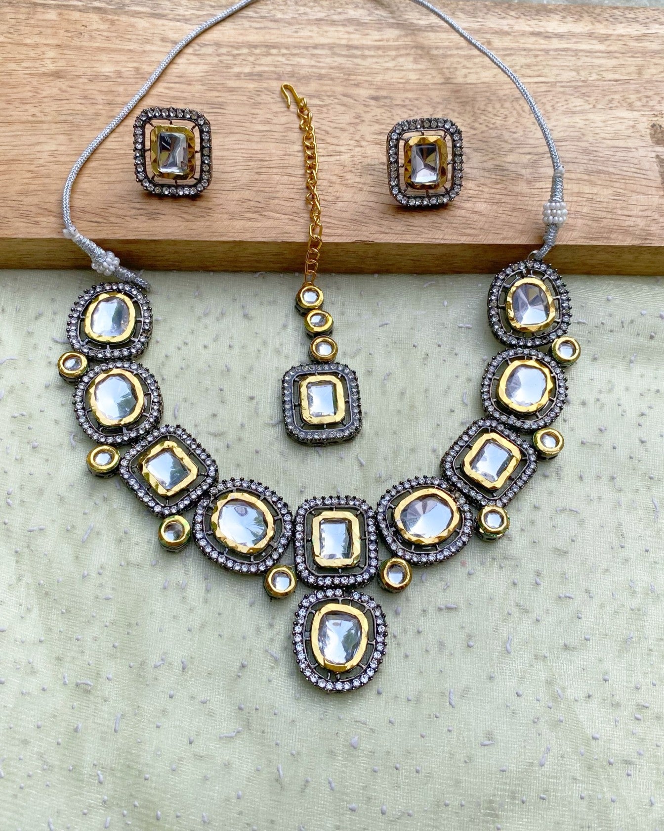 Metal-Gold Kundan Set with Tikka