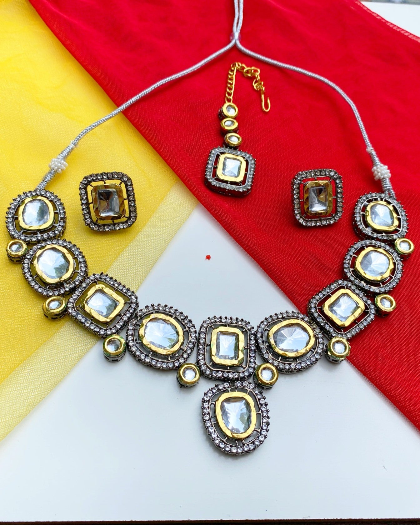Metal-Gold Kundan Set with Tikka